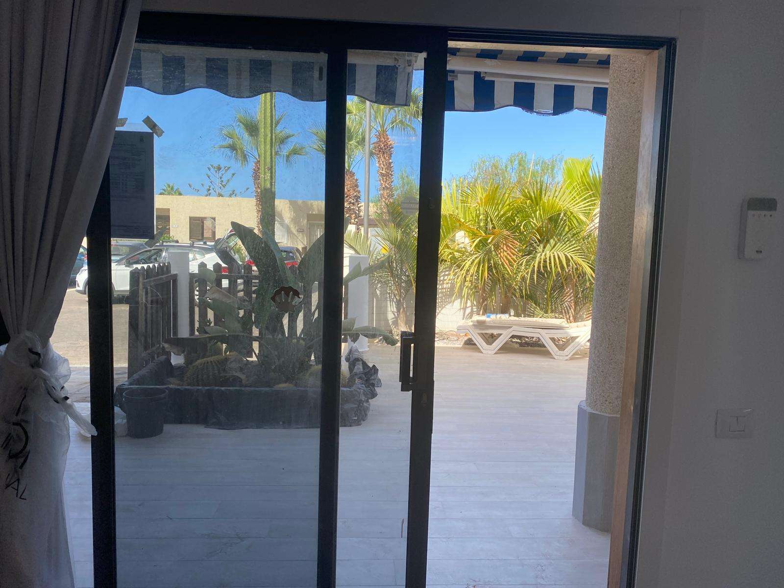 Elegante appartamento ristrutturato con piscina e vista mare a Los Gigantes – Complesso Tamara